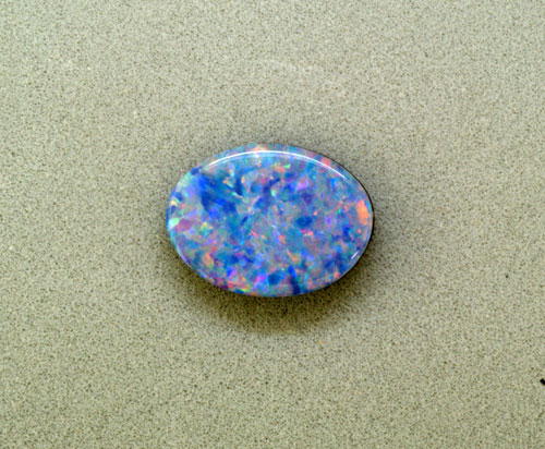 3x5 Oval Australian Opal Doublet (0.16 ct) 3x5 Oval Australian Opal Doublet (0.16 ct)