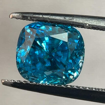 9.35x8.56x8.02 Cushion Blue Zircon (6.93 ct) 9.35x8.56x8.02 Cushion Blue Zircon (6.93 ct)
